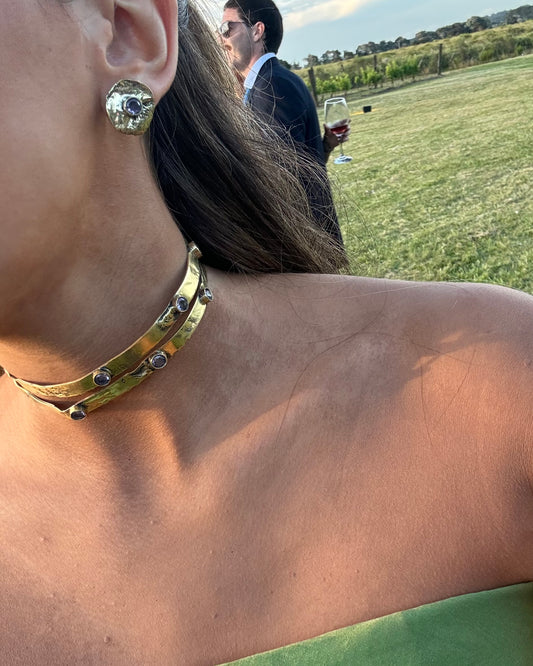 Caravanas lookeadoras doradas con violeta